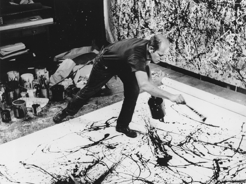 Jackson Pollock painting with his style of Drip Painting