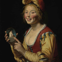 A smiling girl, a courtesan, holding an obscene image by Gerrit van Honthorst