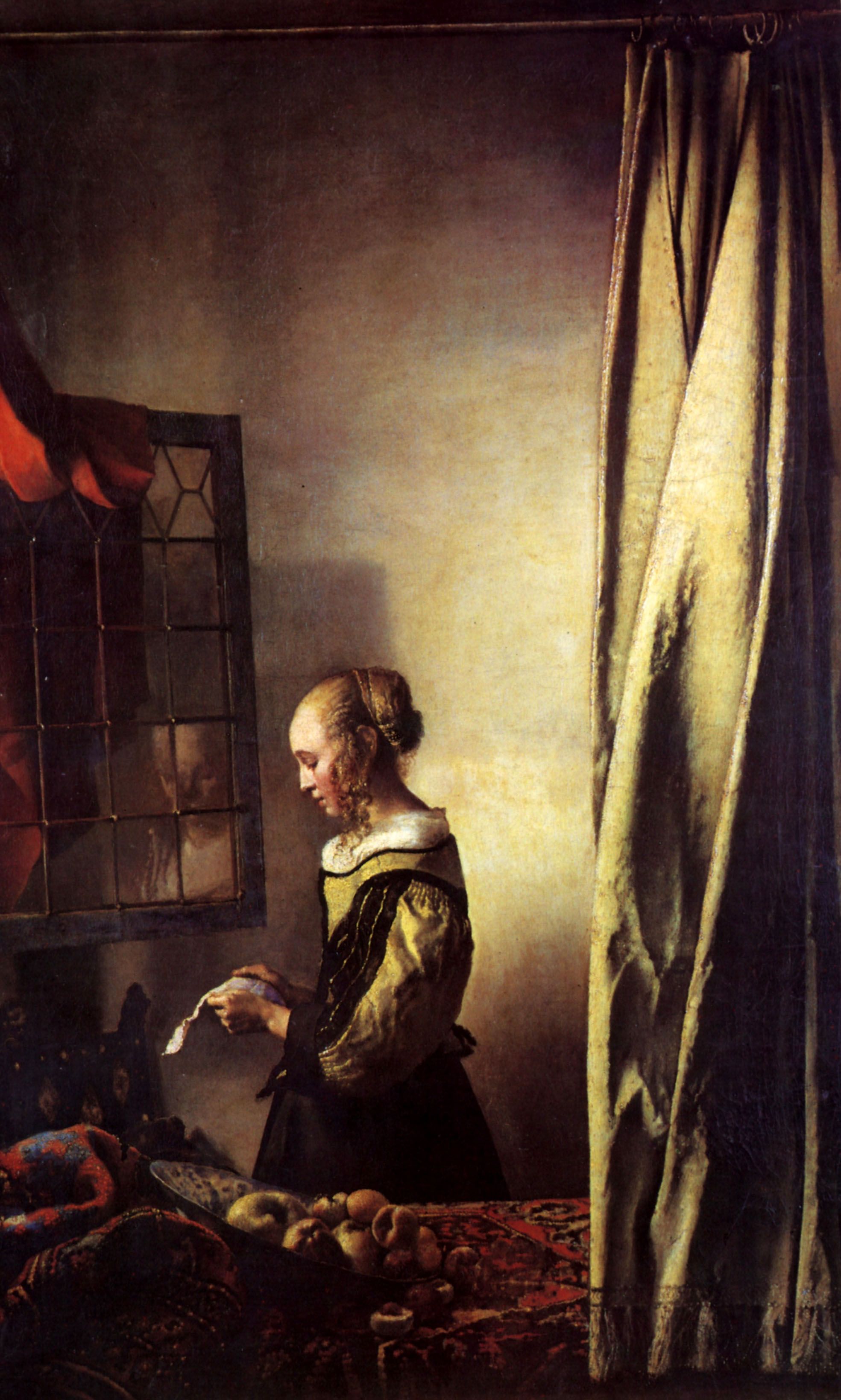 Girl Reading a Letter at an Open Window by Johannes Vermeer